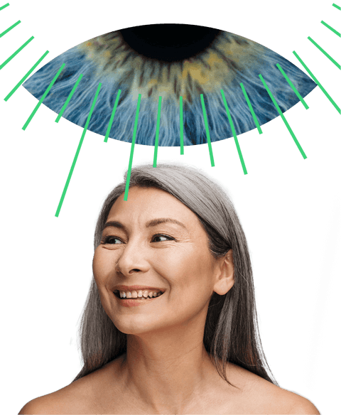 A woman smiling looking at eye